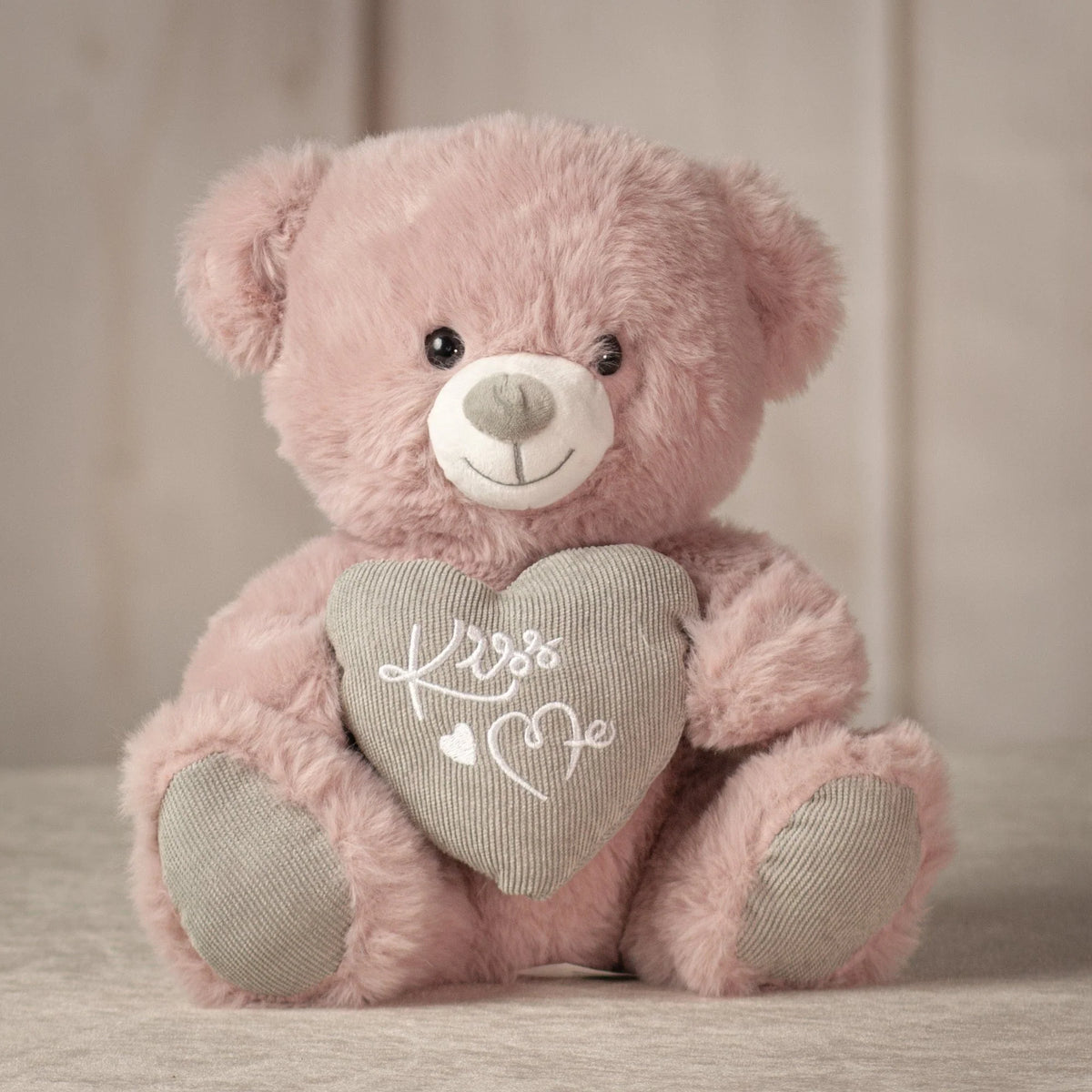 Pink Valentine bear with Love You heart, affordable romantic gift option
